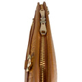 Light brown leather clutch bag with crocodile-style texture, crossbody shoulder strap, and elegant design — LeatherLuxe women’s handbag.