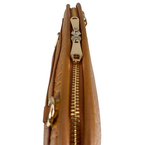 Light brown leather clutch bag with crocodile-style texture, crossbody shoulder strap, and elegant design — LeatherLuxe women’s handbag.