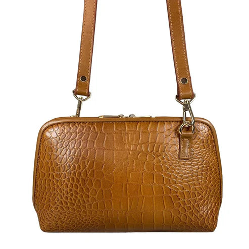 Light brown leather clutch bag with crocodile-style texture, crossbody shoulder strap, and elegant design — LeatherLuxe women’s handbag.