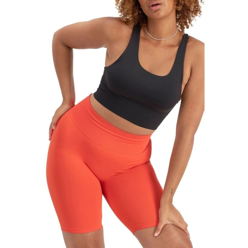 Women's Move Seamless Crop Bra in nylon elastane with high neckline, pullover design, medium support, and moisture-wicking fabric.
