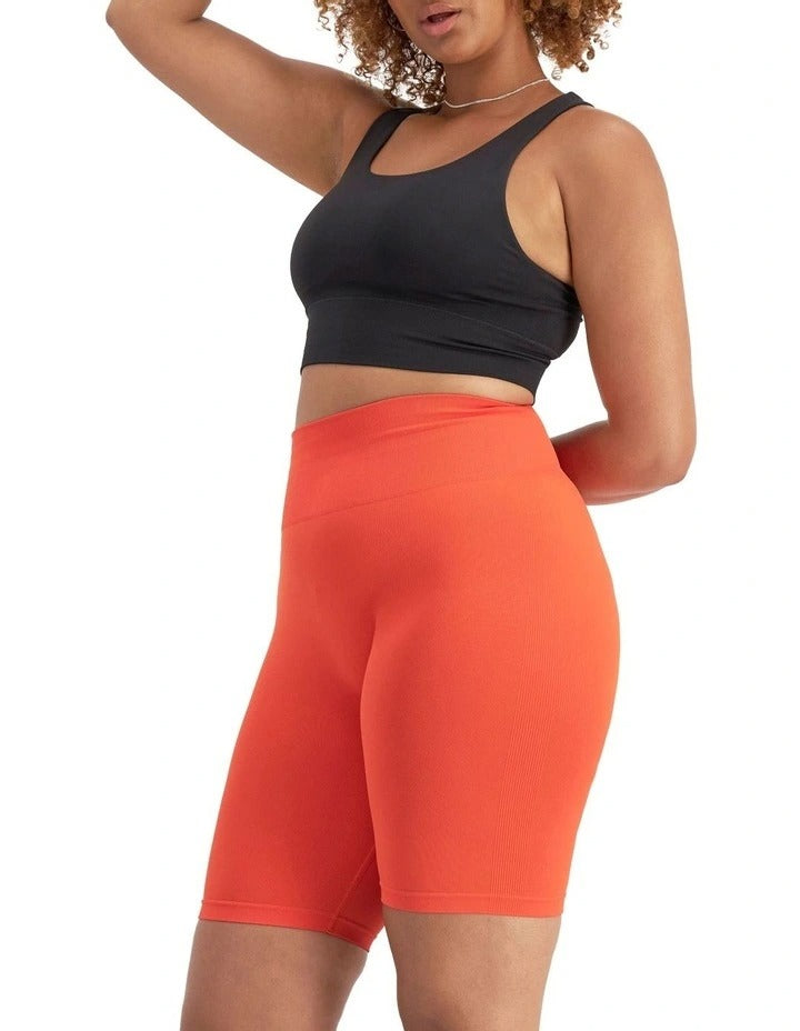 Women's Move Seamless Crop Bra in nylon elastane with high neckline, pullover design, medium support, and moisture-wicking fabric.