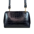 LeatherLuxe black leather clutch bag with detachable shoulder strap and crossbody option – elegant women’s evening handbag made of premium genuine leather.