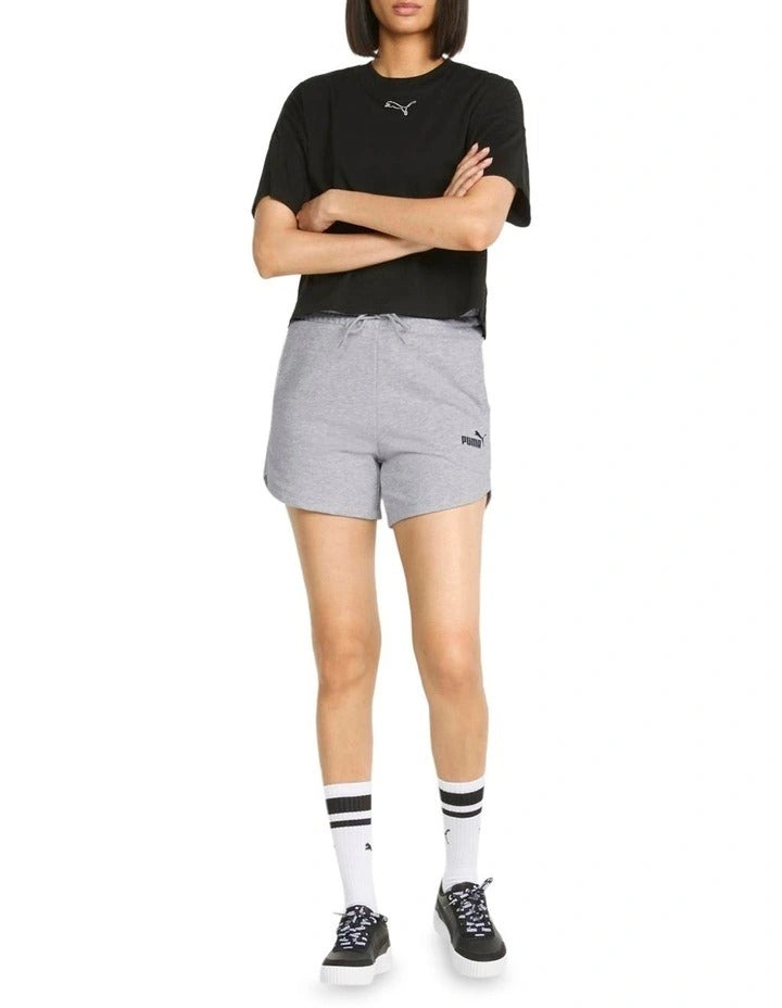 PUMA Essential 5 Inch High Waist Shorts in black with rib waistband, side pockets, and sustainable cotton fabric