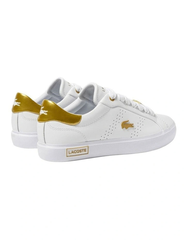 Lacoste Powercourt 2.0 Sneaker in White/Gold, featuring a sleek leather upper with gold accents for a premium, stylish look.