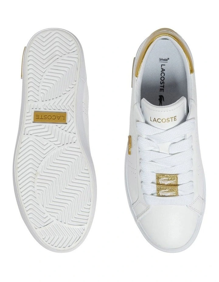 Lacoste Powercourt 2.0 Sneaker in White/Gold, featuring a sleek leather upper with gold accents for a premium, stylish look.