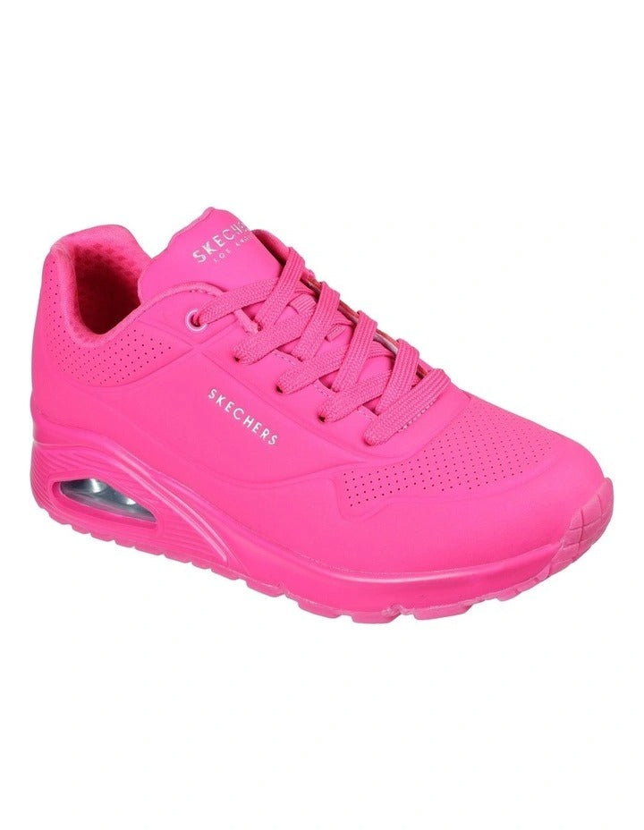 Skechers Uno Neon Nights sneaker in hot pink lifestyle view