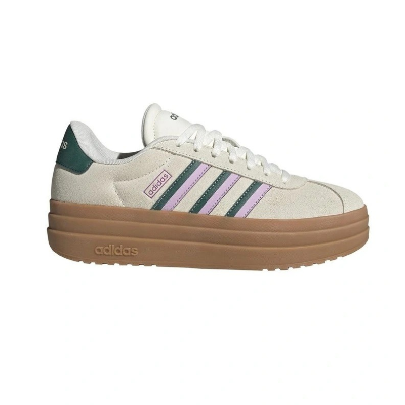 Beige Adidas sneaker with brown sole on a white background