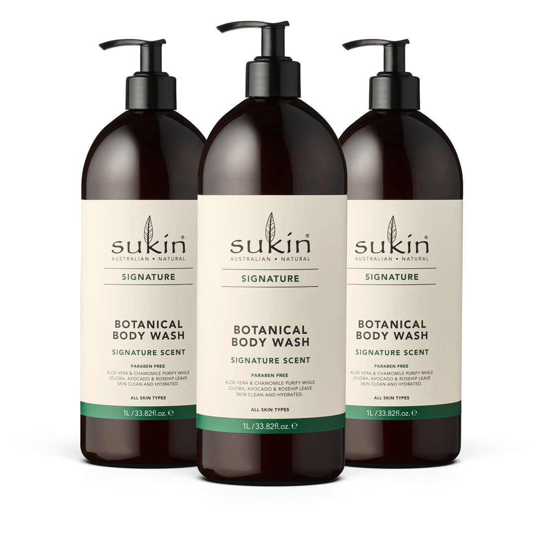 Three bottles of Sukin Botanical Body Wash on a white background