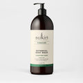 Sukin Botanical Body Wash bottle on a light gray background