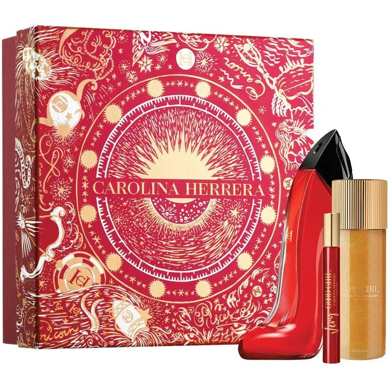 Carolina Herrera perfume set with red bottle and gold packaging on a white background