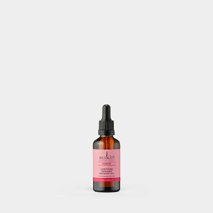 Sukin rosehip oil bottle on a white background