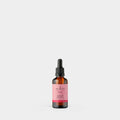 Sukin rosehip oil bottle on a white background