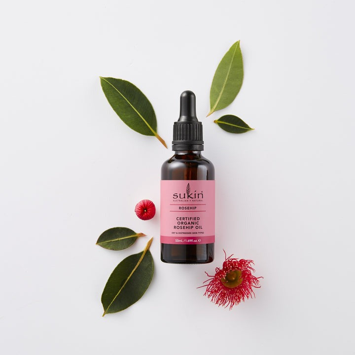 Sukin rosehip oil bottle on a white background