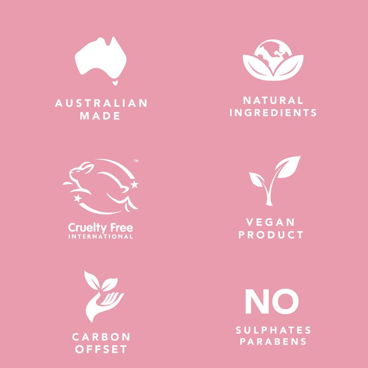 Set of icons and text on a pink background indicating Australian made, natural ingredients, cruelty free, vegan product, carbon offset, and no sulphates or parabens.