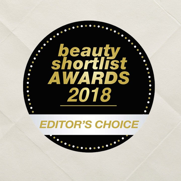 Badge for 'Beauty Shortlist Awards 2018 Editor's Choice' on a textured beige background