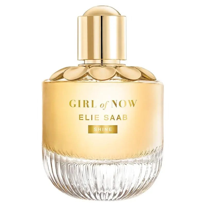 Gold and clear perfume bottle labeled 'Girl of Now' by Elie Saab on a white background