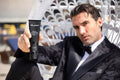 Virtue men’s skincare set with cleanser, exfoliator, moisturizer, face mask, and serum in sleek black packaging displayed with male models