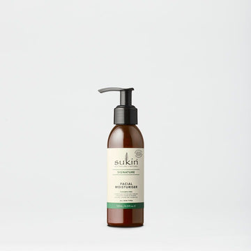Sukin facial moisturizer bottle on a light gray background