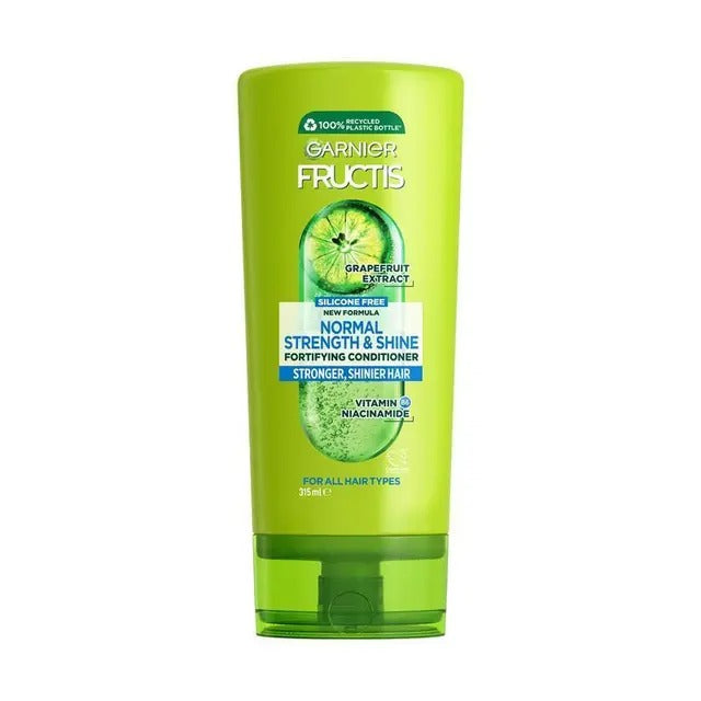Garnier Fructis conditioner bottle with green label on a white background