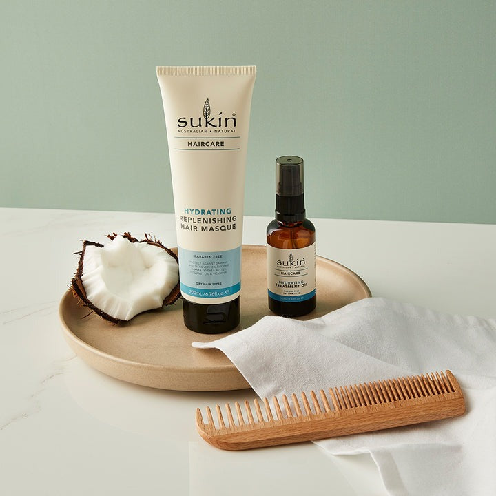 Sukin Hydrating Replenishing Hair Masque tube on a white background