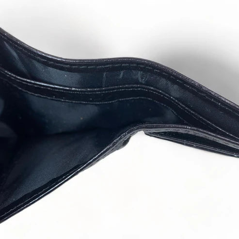 Elegant black genuine leather women’s wallet and card holder with secure locker — stylish and premium accessory by LeatherLuxe