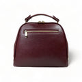 Elegant dark red genuine leather women’s satchel handbag with structured medium design and gold-tone accents — perfect for everyday and office wear.
