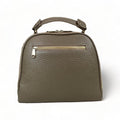 Beige leather women's handbag with shoulder strap — elegant satchel for everyday and formal occasions.
