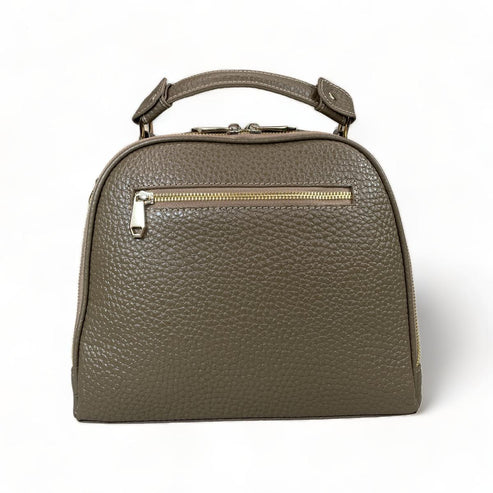 Beige leather women's handbag with shoulder strap — elegant satchel for everyday and formal occasions.