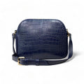 Dark blue genuine leather women’s shoulder bag with crossbody strap, elegant design, and premium finish — LeatherLuxe collection.