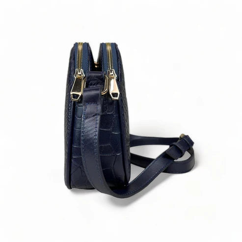 Dark blue genuine leather women’s shoulder bag with crossbody strap, elegant design, and premium finish — LeatherLuxe collection.