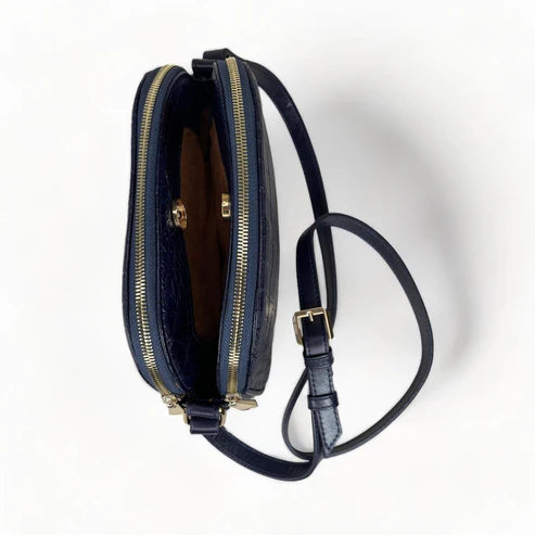 Dark blue genuine leather women’s shoulder bag with crossbody strap, elegant design, and premium finish — LeatherLuxe collection.