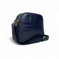 Dark blue genuine leather women’s shoulder bag with crossbody strap, elegant design, and premium finish — LeatherLuxe collection.