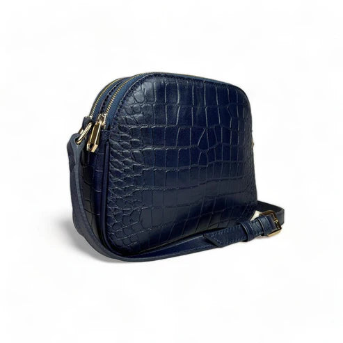 Dark blue genuine leather women’s shoulder bag with crossbody strap, elegant design, and premium finish — LeatherLuxe collection.