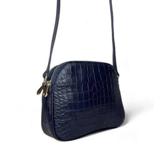 Dark blue genuine leather women’s shoulder bag with crossbody strap, elegant design, and premium finish — LeatherLuxe collection.