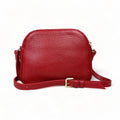 LeatherLuxe red leather women's shoulder bag with adjustable crossbody strap, elegant and stylish design for everyday fashion.