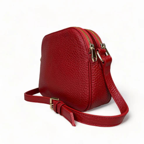 LeatherLuxe red leather women's shoulder bag with adjustable crossbody strap, elegant and stylish design for everyday fashion.