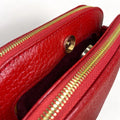 LeatherLuxe red leather women's shoulder bag with adjustable crossbody strap, elegant and stylish design for everyday fashion.