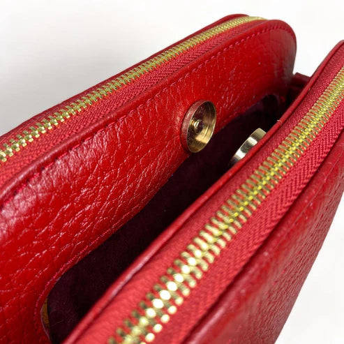 LeatherLuxe red leather women's shoulder bag with adjustable crossbody strap, elegant and stylish design for everyday fashion.
