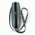 Elegant gray leather women’s shoulder bag and crossbody purse by LeatherLuxe — premium genuine leather handbag with adjustable strap and minimalist modern design.
