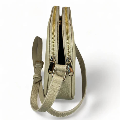 Cream leather women’s shoulder bag and crossbody by LeatherLuxe – elegant, premium quality handbag with adjustable strap and gold-tone hardware.