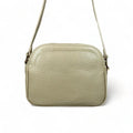 Cream leather women’s shoulder bag and crossbody by LeatherLuxe – elegant, premium quality handbag with adjustable strap and gold-tone hardware.