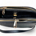 LeatherLuxe black leather women's shoulder bag and crossbody purse with sleek design and gold-tone hardware