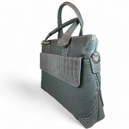 Premium gray leather laptop bag for men and women – sleek unisex professional briefcase with handle and shoulder strap for business and travel.