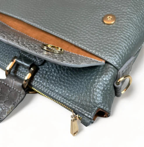 Premium gray leather laptop bag for men and women – sleek unisex professional briefcase with handle and shoulder strap for business and travel.