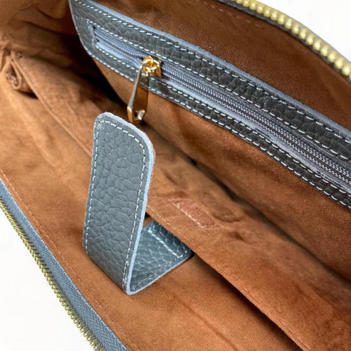 Premium gray leather laptop bag for men and women – sleek unisex professional briefcase with handle and shoulder strap for business and travel.