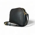 Premium black leather crossbody shoulder bag with adjustable strap, sleek minimalist design, and high-quality stitching for everyday use.