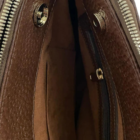 LeatherLuxe brown leather office bag with adjustable shoulder strap, durable stitching, and premium finish — stylish and functional for business and daily use.