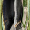 Elegant green crocodile-pattern leather clutch crossbody bag with gold hardware and detachable strap, perfect for evening or casual outings.