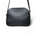 Premium black leather crossbody shoulder bag with adjustable strap, sleek minimalist design, and high-quality stitching for everyday use.
