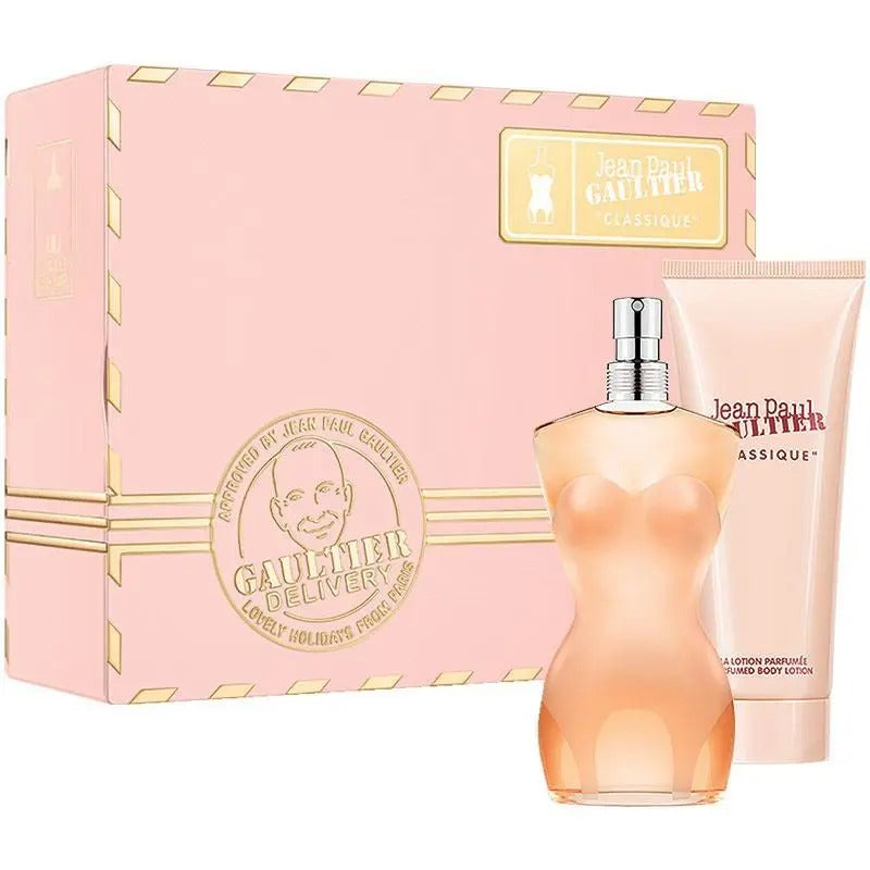 Jean Paul Gaultier perfume set with pink packaging and bottle on a white background